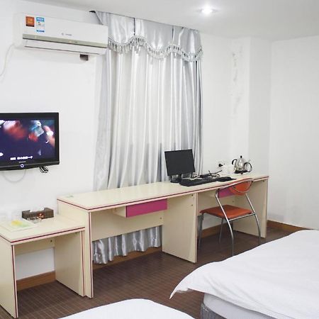 Guangyue Hotel Cantão Quarto foto
